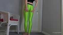 Green leggings in hallway
