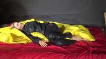 Sexy Sandra wearing sexy shiny nylon rainwear lolling in bed of nylon (Pics)