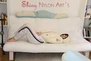 SEXY Jill wearing a WHITE rain pants and a WHITE down jacket lolling on the sofa playing with you (Pics)