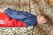 Beautiful archive girl tied and gagged wearing an wonderful red shiny nylon shorts and a shiny red rain jacket (Pics)