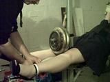 Sandra tied on a gym 1/2