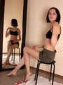 Emily bound with rope, sittin on the stool
