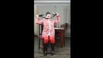 Selfbondage in raingear and transparent raincoat