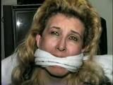 44 Yr OLD HOUSEKEEPER IS PANTY LESS, MOUTH STUFFED WITH STINKY NYLON STOCKING, TOE TIED & 4 CLEAVE GAGS (D40-13)