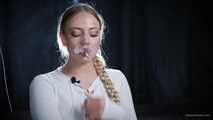 Smoking strong cork cigarette in the studio