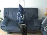 Get 3 classic archive videos with Katharina bound and gagged in shiny nylon rainwear