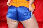 ***HOT HOT HOT JILL DIAMOND*** wearing a sexy bra and a shiny nylon shorts and putting on a life jacket enjoying the feeling of the straps (Pics)
