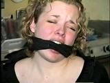 19 YEAR OLD COLLEGE STUDENT SHANA IS TIGHTLY BOUND TO A CHAIR AND HAS HER MOUTH STUFFED & CLEAVE GAGGED ON SCREEN 2 TIMES (D53-10)