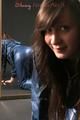 Alina posing in a studio wearing a supersexy blue rainwear combination (Pics)