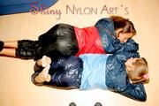 Stella and Leonie having fun with eachother wearing sexy shiny nylon rainwear (Pics)