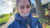 Rey Sanson bound and gagged in a shiny Downcoat