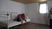 Lana roped on bed 2