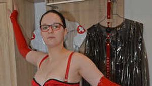 Bound in red latexdress