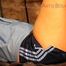 Pia tied and gagged on a princess bed in an old cellar wearing a sexy dark blue nylon shorts and an oldschool blue rain jacket (Pics)