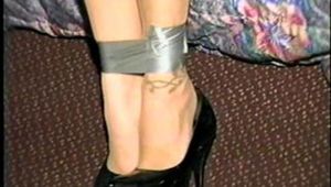ONE SEXY TAPE BOUND, WRAP TAPE & BALL-GAGGED HOSTAGE (D24-17)