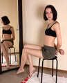 Emily bound with rope, sittin on the stool