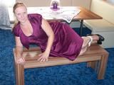 Hogtied on a table 