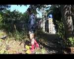 Mara wearing only a hot rain jacket and rubber boots lingering in the garden taking a shower (Video)
