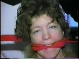 25 YR OLD CHARLENE GETS MOUTH STUFFED, CLEAVE GAGGED, BLINDFOLDED, TIED TO CHAIR, LINGERIE, GARTER BELT & NYLONS (D61-13)