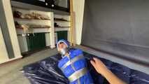 Lana tied and gagged in shiny nylon Rainwear desperately trying to free herself