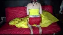 SEXY MARA ties and gagges herself with cuffs and a ball gag wearing a sexy red/yellow shiny nylon shorts and a sexy yellow top (Video)
