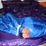 Alina tied and gagged in a shiny skisuit