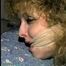BEAUTIFUL DOE EYED REBECCA GETS MOUTH STUFFED, ACE BANDAGE GAGGED & HOG-TIED (D29-12)