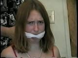 24 Yr OLD CRAFTER IS CLEAVE GAGGED, MOUTH STUFFED, HAND GAGGED, OTM GAGGED & TIED TO A CHAIR (D55-6)