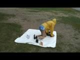 Being with Enni sitting at a lake wearing sexy shiny nylon rainwear (Video)