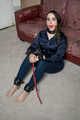 Zara in Blouse and Leather Cuffs