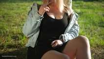 Nastya is smoking in the park