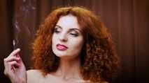 Wild and free girl Yuliya is definitely enjoying a strong 100mm black cigarette