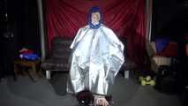 Sexy SONJA wearing a hot downwear combination being tied and gagged with ropes and a clothgag on a hairdressers chair covered with a raincape (Video)