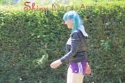 Mara wearing a purple shiny nylon shorts and a black rain jacket playing soccer (Pics)
