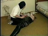 TAPE WRAPPING UP A LITTLE DOLL (D10-2)
