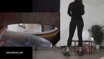 Mistress Cleo squirts cologne into the mouth of the slave lying in the toilet. Picture in Picture
