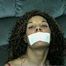 28 YR OLD MOM GETS MOUTH STUFFED, MEDICAL TAPE & SEMI-CLEAR TAPE GAGGED, HANDGAGGED, VIBRATOR USED ON TITS & WEARING LINGERIE, GARTER BELT & NYLON STOCKINGS (D59-15)