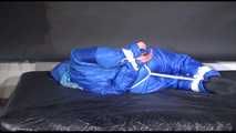 Lucy tied and gagged with ropes on bed wearing sexy blue oldschool downwear (Video)