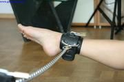 Marion handcuffed and collared