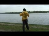 Being with Enni sitting at a lake wearing sexy shiny nylon rainwear (Video)