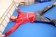 A nice cuty hooded, tied and gagged on bed