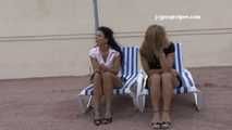 016183 Eve Takes A Daring Pee From A Sun Lounger