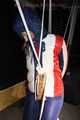 SEXY SONJA tied and gagged with ropes and a clothgag suspended wearing a sexy red/blue downwear combination (Pics)