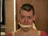 PUNK MELA IS BAREFOOT,MOUTH STUFFED, CLEAVE GAGGED, TOE-TIED & TRIES TO MAKE PHONE CALL (D43-11)