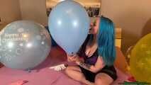 nail2pop big balloons on bed