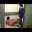 04:20 Min. video with Simone tied and gagged by Jill in shiny nylon rainwear