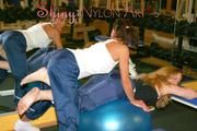 Stella and Leonie in a fitness studio wearing supersexy rainwear (Pics)