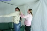Dana + Tanja playing with straitjackets