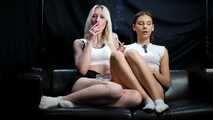 Two Beautiful Girls Smoking Together in white socks