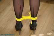 Leatherlady in yellow ropes